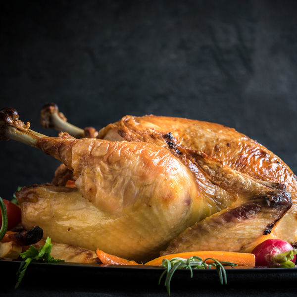 Served roasted turkey with vegetables